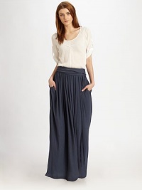 Featherweight cotton crepe shaped by a scoopneck and chic roll-tab sleeves.ScoopneckShort sleevesBodice seamsContour hemAbout 25 from shoulder to hemCottonDry cleanImported Featherweight cotton crepe shaped by a scoopneck and chic roll-tab sleeves.ScoopneckShort sleevesBodice seamsContour hemAbout 25 from shoulder to hemCottonDry cleanImported