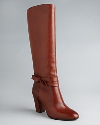 These kate spade new york tall boots are the height of sophistication, with a subtle ankle wrap detail that sets them apart from the crowd. These kate spade new york tall boots are the height of sophistication, with a subtle ankle wrap detail that sets them apart from the crowd.