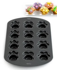 Bring on spring! Parties & get-togethers come into bloom with these spring-inspired treats. Crafted from steel, this durable, nonstick pan features extra-wide crowns to create 12 butterfly-, tulip- and blossom-shaped treats. Have fun decorating & even more fun sharing! 10-year warranty. Bring on spring! Parties & get-togethers come into bloom with these spring-inspired treats. Crafted from steel, this durable, nonstick pan features extra-wide crowns to create 12 butterfly-, tulip- and blossom-shaped treats. Have fun decorating & even more fun sharing! 10-year warranty.