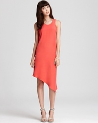 Cut from luxe silk, this brightly hued Kain Label dress flaunts an asymmetrical hem for hyper-modern style. Cut from luxe silk, this brightly hued Kain Label dress flaunts an asymmetrical hem for hyper-modern style.