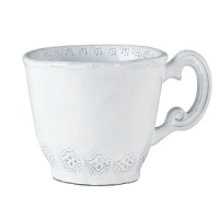 Handmade from Venetian terra marrone, or brown clay, this pretty white porcelain mug is delicately decorated with a leaf motif. Handmade from Venetian terra marrone, or brown clay, this pretty white porcelain mug is delicately decorated with a leaf motif.