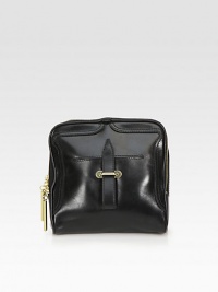 A boxy leather style that defines a style that is classic and cool.Detachable wristlet, 5 dropTop zip closureOne outside open pocketOne inside zip pocketFully lined7½W X 7H X 3½DImported A boxy leather style that defines a style that is classic and cool.Detachable wristlet, 5 dropTop zip closureOne outside open pocketOne inside zip pocketFully lined7½W X 7H X 3½DImported