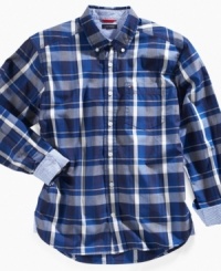 Tommy Hilfiger updates the traditional button-down shirt with a bolder plaid and the surprise of contrast lining in the collar and cuffs. Tommy Hilfiger updates the traditional button-down shirt with a bolder plaid and the surprise of contrast lining in the collar and cuffs.