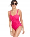 This elegant one-piece swimsuit from Miraclesuit is the perfect choice for a day by the pool. Its soft crisscrossed draping flatters women of all shapes and sizes!
