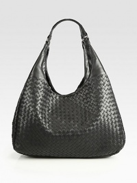 Simply-chic in butter-smooth leather, woven in a slouchy hobo silhouette.Double top handles, 8¾ dropLoop-and-hook closureOne inside zip pocketOne inside open pocketSuede lining15¾W X 10H X 6½DMade in Italy Simply-chic in butter-smooth leather, woven in a slouchy hobo silhouette.Double top handles, 8¾ dropLoop-and-hook closureOne inside zip pocketOne inside open pocketSuede lining15¾W X 10H X 6½DMade in Italy