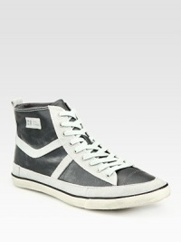Handsome design with an edgy, downtown attitude in contrasting leather and suede.Leather liningPadded insoleRubber soleImported Handsome design with an edgy, downtown attitude in contrasting leather and suede.Leather liningPadded insoleRubber soleImported