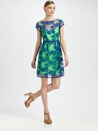 Styled in high-impact hues, this lace confection has a boatneck, cap sleeves and back keyhole detail. BoatneckCap sleevesElasticized waistbandBack keyhole closureBack zipperIncludes contrasting slipAbout 22 from natural waist50% cotton/50% nylonDry cleanMade in Italy of USA fabricModel shown is 5'10 (177cm) wearing US size 2. Styled in high-impact hues, this lace confection has a boatneck, cap sleeves and back keyhole detail. BoatneckCap sleevesElasticized waistbandBack keyhole closureBack zipperIncludes contrasting slipAbout 22 from natural waist50% cotton/50% nylonDry cleanMade in Italy of USA fabricModel shown is 5'10 (177cm) wearing US size 2.