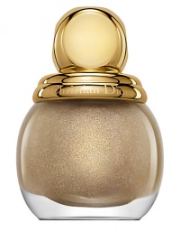 The whimsical and playful masquerade balls of his time, embodied Christian Dior's love of surprise and elegance. Today, the House of Dior embodies that same sense of extravagant splendor with a golden holiday collection of limited edition items. Diorific Vernis Nail Lacquers are vibrant, high-shine nail lacquers encased in precious glass bottles accented with gold toppers. They leave your nails perfectly polished for the Dior Grand Ball. The whimsical and playful masquerade balls of his time, embodied Christian Dior's love of surprise and elegance. Today, the House of Dior embodies that same sense of extravagant splendor with a golden holiday collection of limited edition items. Diorific Vernis Nail Lacquers are vibrant, high-shine nail lacquers encased in precious glass bottles accented with gold toppers. They leave your nails perfectly polished for the Dior Grand Ball.