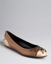 With skinny trousers and a crisp white shirt, these metallic Burberry ballet flats underline classic elegance. With skinny trousers and a crisp white shirt, these metallic Burberry ballet flats underline classic elegance.