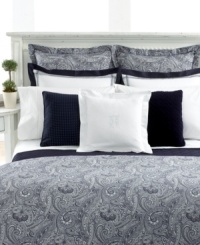 Tailored with precision, this standard sham features unique two-toned blue hemstitching between its pure white center and navy border – a sophisticated complement to the Navy Paisley Suite bedding collection from Lauren Ralph Lauren. Tailored with precision, this standard sham features unique two-toned blue hemstitching between its pure white center and navy border – a sophisticated complement to the Navy Paisley Suite bedding collection from Lauren Ralph Lauren.