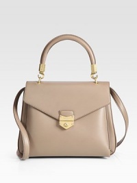 Smooth calfskin leather in a structured, lady-like frame with a detachable shoulder strap.Top handle, 4¾ dropDetachable shoulder strap, 17¾ dropFlap clasp closureOne outside open pocket under flapOne inside zip pocketCotton lining12W X 8¾H X 3DMade in Italy