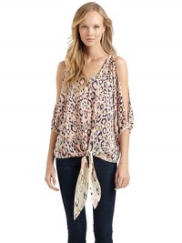 THE LOOKLeopard printV-neckCutout shouldersThree-quarter length dolman sleeves with banded cuffsTie-front waistTHE FITAbout 24 from shoulder to hemTHE MATERIALSilkContrast: rayonCARE & ORIGINDry cleanMade in USAModel shown is 5'8 (172½cm) wearing US size Small. THE LOOKLeopard printV-neckCutout shouldersThree-quarter length dolman sleeves with banded cuffsTie-front waistTHE FITAbout 24 from shoulder to hemTHE MATERIALSilkContrast: rayonCARE & ORIGINDry cleanMade in USAModel shown is 5'8 (172½cm) wearing US size Small.