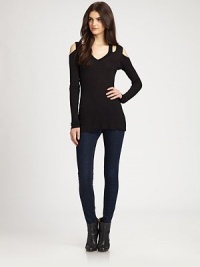 Clever cutout shoulders and a lengthy silhouette renew this lightweight must-have. V-neckCutout shouldersLong sleevesLonger length hits below the hips79% viscose/15% wool/6% spandexDry cleanMade in USA of imported fabricModel shown is 5'9½ (176cm) wearing US size Small. Clever cutout shoulders and a lengthy silhouette renew this lightweight must-have. V-neckCutout shouldersLong sleevesLonger length hits below the hips79% viscose/15% wool/6% spandexDry cleanMade in USA of imported fabricModel shown is 5'9½ (176cm) wearing US size Small.