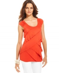 Crisscrossing tiers of ruffles define this slinky stretch jersey top from AGB as an effortless essential for the season. Try it with your favorite jeans for a flirty look that transitions seamlessly from day to night. Crisscrossing tiers of ruffles define this slinky stretch jersey top from AGB as an effortless essential for the season. Try it with your favorite jeans for a flirty look that transitions seamlessly from day to night.
