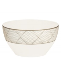 Dressed in a fine diamond grid of bronze and warm taupe, these small round bowls are tailored for formal dining and everyday elegance in bone china from Noritake dinnerware. The dishes are a handsome host for rice, sides or toppings. Dressed in a fine diamond grid of bronze and warm taupe, these small round bowls are tailored for formal dining and everyday elegance in bone china from Noritake dinnerware. The dishes are a handsome host for rice, sides or toppings.