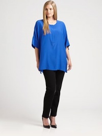 Sumptuous silk gives this relaxed-fit top luxurious appeal. Round neckElbow-length sleevesSide slitsAbout 31 from shoulder to hemSilkDry cleanImported Sumptuous silk gives this relaxed-fit top luxurious appeal. Round neckElbow-length sleevesSide slitsAbout 31 from shoulder to hemSilkDry cleanImported