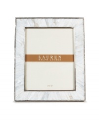 Enhance the look of any photo when framed in the beauty of Mother of Pearl. A slim line of carved steel trim surrounds this natural composition with classic style, only from Lauren by Ralph Lauren. Enhance the look of any photo when framed in the beauty of Mother of Pearl. A slim line of carved steel trim surrounds this natural composition with classic style, only from Lauren by Ralph Lauren.
