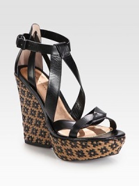 Woven multi-tone leather wedge with an adjustable wrap-around ankle strap. Woven leather wedge, 5 (125mm)Woven leather platform, 1½ (40mm)Compares to a 3½ heel (90mm)Leather upperAdjustable ankle strapLeather liningRubber soleImportedOUR FIT MODEL RECOMMENDS ordering true size. Woven multi-tone leather wedge with an adjustable wrap-around ankle strap. Woven leather wedge, 5 (125mm)Woven leather platform, 1½ (40mm)Compares to a 3½ heel (90mm)Leather upperAdjustable ankle strapLeather liningRubber soleImportedOUR FIT MODEL RECOMMENDS ordering true size.