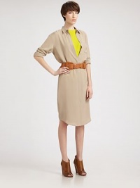 Minimal and chic, this supple silk design in tailored with classic shirt details and a loose, body-skimming fit.Shirt collarConcealed button frontLong sleeves with button cuffsBreast patch pocketInverted black pleatAbout 26 from natural waistSilkDry cleanMade in Italy of imported fabricModel shown is 5'10 (177cm) wearing US size 4. Minimal and chic, this supple silk design in tailored with classic shirt details and a loose, body-skimming fit.Shirt collarConcealed button frontLong sleeves with button cuffsBreast patch pocketInverted black pleatAbout 26 from natural waistSilkDry cleanMade in Italy of imported fabricModel shown is 5'10 (177cm) wearing US size 4.