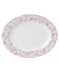 Scattered with dainty blooms, the Rose Confetti oval platter restores the grace and charm of another era in fine bone china from Royal Albert. A scalloped edge with gold banding and a traditionally feminine palette add to its romantic sensibility. Scattered with dainty blooms, the Rose Confetti oval platter restores the grace and charm of another era in fine bone china from Royal Albert. A scalloped edge with gold banding and a traditionally feminine palette add to its romantic sensibility.