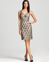 Golden sequins take on a scalloped form on this embellished Sue Wong dress. Team with ornate jewels for a vintage-inspired look. Golden sequins take on a scalloped form on this embellished Sue Wong dress. Team with ornate jewels for a vintage-inspired look.