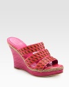 Chunky stacked wedge with braided espadrille trim and tastefully textured straps. Stacked wedge, 4 (100mm)Covered platform, 1 (25mm)Compares to a 3 heel (75mm)Leather upperLeather lining and solePadded insoleImportedOUR FIT MODEL RECOMMENDS ordering one half size up as this style runs small. 