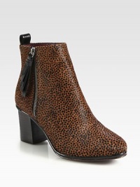 A daring animal print freshens this season's favorite silhouette, topped with an exposed zipper and patent leather trim. Stacked heel, 3 (75mm)Calf hair upper with patent leather trimExposed side zipLeather lining and solePadded insoleImported A daring animal print freshens this season's favorite silhouette, topped with an exposed zipper and patent leather trim. Stacked heel, 3 (75mm)Calf hair upper with patent leather trimExposed side zipLeather lining and solePadded insoleImported