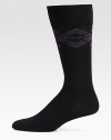Lightweight and luxurious solid dress socks with logo detail, finished in a comfortable cotton-blend.Mid-calf height34% polyamide/34% cotton/30% modal/2% elastaneMachine washImported