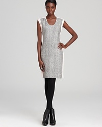 Satisfy your need for tweed in a dimensional DIANE von FURSTENBERG dress. A tweed front, contrasting side panels, and solid back make this a mixed media masterpiece. Satisfy your need for tweed in a dimensional DIANE von FURSTENBERG dress. A tweed front, contrasting side panels, and solid back make this a mixed media masterpiece.
