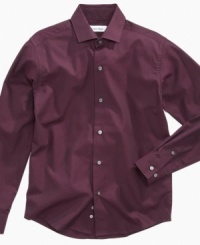 Make 'em look. The iridescent style of this Calvin Klein woven shirt gives him an edge in the looks department. Make 'em look. The iridescent style of this Calvin Klein woven shirt gives him an edge in the looks department.