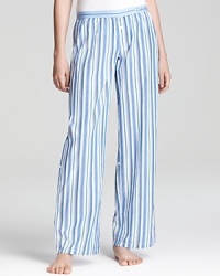 Transition from season to season in Calvin Klein Underwear's striped pajama pants, featuring buttons to roll up to capri length. Transition from season to season in Calvin Klein Underwear's striped pajama pants, featuring buttons to roll up to capri length.