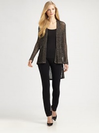 A glistening hi-lo sweater made from Italian fabrication.Open-front designLong sleevesHi-lo hemAbout 28 from shoulder to hemCotton/viscose/linen/metallic threadDry cleanImported of Italian fabricSIZE & FIT Model shown is 5'10½ (179cm) wearing a US size Small. A glistening hi-lo sweater made from Italian fabrication.Open-front designLong sleevesHi-lo hemAbout 28 from shoulder to hemCotton/viscose/linen/metallic threadDry cleanImported of Italian fabricSIZE & FIT Model shown is 5'10½ (179cm) wearing a US size Small.