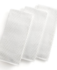 Grab style and keep function with a set of three kitchen towels that step forward in eye-catching color to wipe up spills, aid in prep and add an accent to your space. The textured design sets a sharp appearance for any room, while the highly absorbent terry quickly cleans up. Limited lifetime warranty. Grab style and keep function with a set of three kitchen towels that step forward in eye-catching color to wipe up spills, aid in prep and add an accent to your space. The textured design sets a sharp appearance for any room, while the highly absorbent terry quickly cleans up. Limited lifetime warranty.
