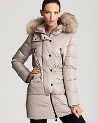 Black hardware adds modern appeal to Moncler's Fragon coat, a fur-trimmed style that breathes warm, timeless style into every winter to come. Black hardware adds modern appeal to Moncler's Fragon coat, a fur-trimmed style that breathes warm, timeless style into every winter to come.