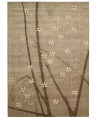 Add a nature-inspired touch to your home with this blossom-strewn rug by Calvin Klein. Accented with striking blades of grass against night-gray air, this fashionable piece is woven from a soft, yet durable wool blend. (Clearance) Add a nature-inspired touch to your home with this blossom-strewn rug by Calvin Klein. Accented with striking blades of grass against night-gray air, this fashionable piece is woven from a soft, yet durable wool blend. (Clearance)