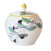 Adapted from botanical drawings of gardens in Mumbai, India, where an abundance of rare plant species grow, precisely detailed floral and vegetal illustrations adorn this fine porcelain sugar bowl from Bernardaud. It's edged with a rattan trompe l'oeil pattern reminiscent of popular Indian furniture designs.