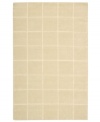An a-tonal blocked design in luminous ivory creates a sophisticated, modern accent in the Westport area rug from Nourison. Hand-tufted in  India of pure wool for premium softness and durability.