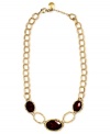 Round out your look with this linked necklace from Jones New York. Gorgeous red beads in epoxy with abalone sheeting lend a soothing finish. Crafted in worn gold tone mixed metal. Approximate length: 15 inches + 2-1/2-inch extender.