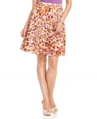 The pleated skirt gets sophisticated thanks to a colorful abstract print, from Jones New York. Pair it with a tucked-in tank top in a vibrant hue for a chic ensemble. The pleated skirt gets sophisticated thanks to a colorful abstract print, from Jones New York. Pair it with a tucked-in tank top in a vibrant hue for a chic ensemble.