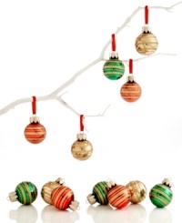Decorate by the dozen! Wrapped in gold glitter, these shiny glass ball ornaments from Martha Stewart Collection make a big impact on your tree. Decorate by the dozen! Wrapped in gold glitter, these shiny glass ball ornaments from Martha Stewart Collection make a big impact on your tree.