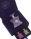 Stashed securely in the top drawer of a bi-level jewel box is a 1.7 oz. Swarovski gem-encrusted bottle of the Scent of Peace, its dove and curlicue design delicately traced with Swarovski stones. Down below are two miniature flacons both containing the Scent of Peace, covered all over in purple velvet and amethyst Swarovski gems. Made in USA. 