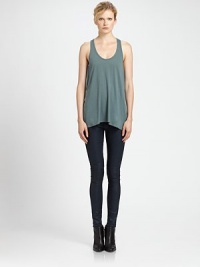 From the HELMUT capsule collection. Balance out statement pants with this soft foundation piece, enhanced by a scoopneck, sporty racerback and length that hits below the hips. ScoopneckSleevelessRacerbackLonger length hits below the hipsAbout 16 from natural waist50% modal/50% supima cottonDry cleanImportedModel shown is 5'11 (178cm) wearing US size Small. From the HELMUT capsule collection. Balance out statement pants with this soft foundation piece, enhanced by a scoopneck, sporty racerback and length that hits below the hips. ScoopneckSleevelessRacerbackLonger length hits below the hipsAbout 16 from natural waist50% modal/50% supima cottonDry cleanImportedModel shown is 5'11 (178cm) wearing US size Small.