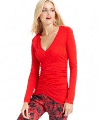 A classic V-neck tee gets a feminine touch with ruching and a fitted silhouette. By DKNY Jeans. A classic V-neck tee gets a feminine touch with ruching and a fitted silhouette. By DKNY Jeans.