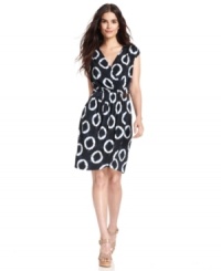 Perfect for every occasion, a faux-wrap dress from MICHAEL Michael Kors transitions from work to weekend with ease. The allover batik-inspired print and faux-leather buckle give this forever-chic staple its fresh spin. Perfect for every occasion, a faux-wrap dress from MICHAEL Michael Kors transitions from work to weekend with ease. The allover batik-inspired print and faux-leather buckle give this forever-chic staple its fresh spin.