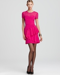 In a hot pink hue, this standout DKNY dress (crafted in crepe de chine) lends brilliantly bright style. In a hot pink hue, this standout DKNY dress (crafted in crepe de chine) lends brilliantly bright style.