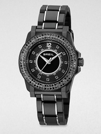 Rows of dramatic black Swarovski crystals and an ultra-light black link bracelet create a timeless contrast of tradition and tech.Quartz movementWater resistant to 10 ATMStainless steel round case with black polycarbonate finish, 35mm diameter (1.38)Crystal bezelBlack dialArabic numeral 12 and crystal hour markersSecond handLightweight black polycarbonate link bracelet with stainless steel accentsImported Rows of dramatic black Swarovski crystals and an ultra-light black link bracelet create a timeless contrast of tradition and tech.Quartz movementWater resistant to 10 ATMStainless steel round case with black polycarbonate finish, 35mm diameter (1.38)Crystal bezelBlack dialArabic numeral 12 and crystal hour markersSecond handLightweight black polycarbonate link bracelet with stainless steel accentsImported