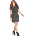 Pounce on an ultra-hot look with DKNYC's short sleeve plus size dress, featuring an animal print. (Clearance)