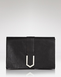 The power clutch is a key trend takeaway. This understated style from ALLIBELLE tackles it, crafted of leather and secured with a sleek snap closure. The power clutch is a key trend takeaway. This understated style from ALLIBELLE tackles it, crafted of leather and secured with a sleek snap closure.