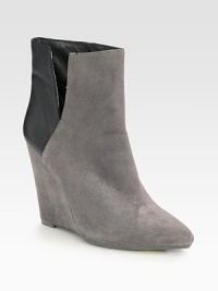 Urban-ready suede and leather design on a sturdy wedge, with a side slit for easy on and off access. Suede-covered wedge, 4¼ (110mm)Suede and nappa leather upperPoint toePull-on style with side slitLeather liningRubber solePadded insoleImported Urban-ready suede and leather design on a sturdy wedge, with a side slit for easy on and off access. Suede-covered wedge, 4¼ (110mm)Suede and nappa leather upperPoint toePull-on style with side slitLeather liningRubber solePadded insoleImported