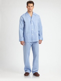 Two-piece set, woven in crisp, smooth cotton, with piping detail that offers a traditional look for the distinguished gentleman. Cotton. Machine wash. Imported.SHIRTButton-frontChest, waist patch pocketsPANTSSide elastic waistbandInseam, about 31 Two-piece set, woven in crisp, smooth cotton, with piping detail that offers a traditional look for the distinguished gentleman. Cotton. Machine wash. Imported.SHIRTButton-frontChest, waist patch pocketsPANTSSide elastic waistbandInseam, about 31